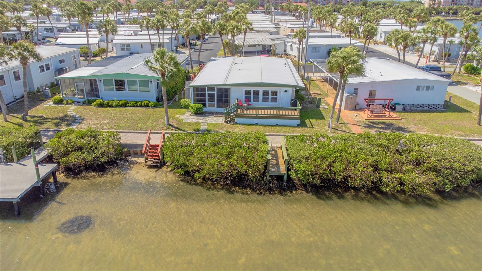 Rear of home with observation dock.
