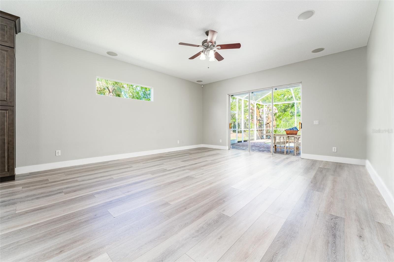 View of Conservation lot and Pool Area from Family Room
