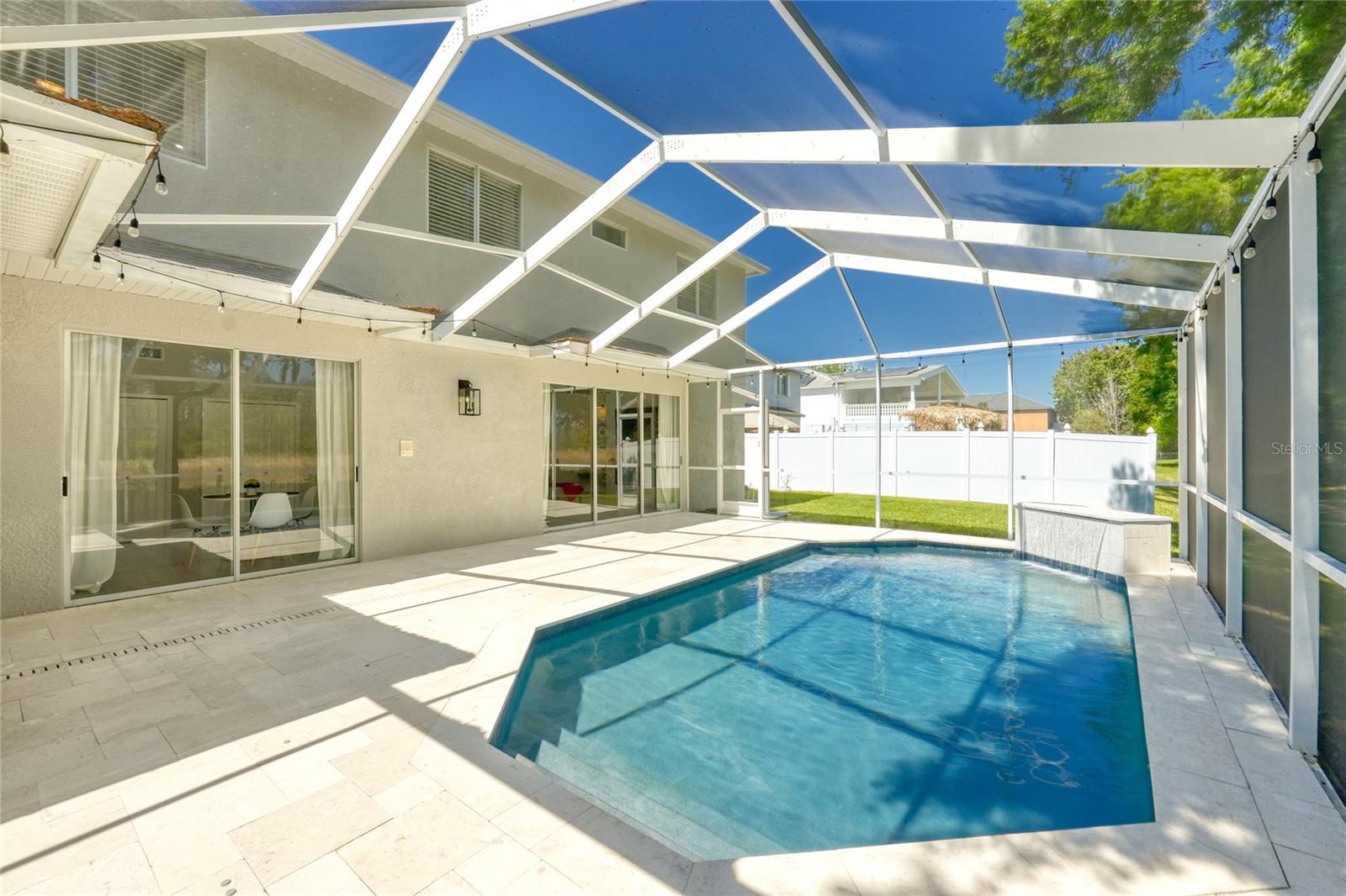 You could take the steps or CANNONBALL into this pool! Did we mention that has 30 Year Pebbletec coating?