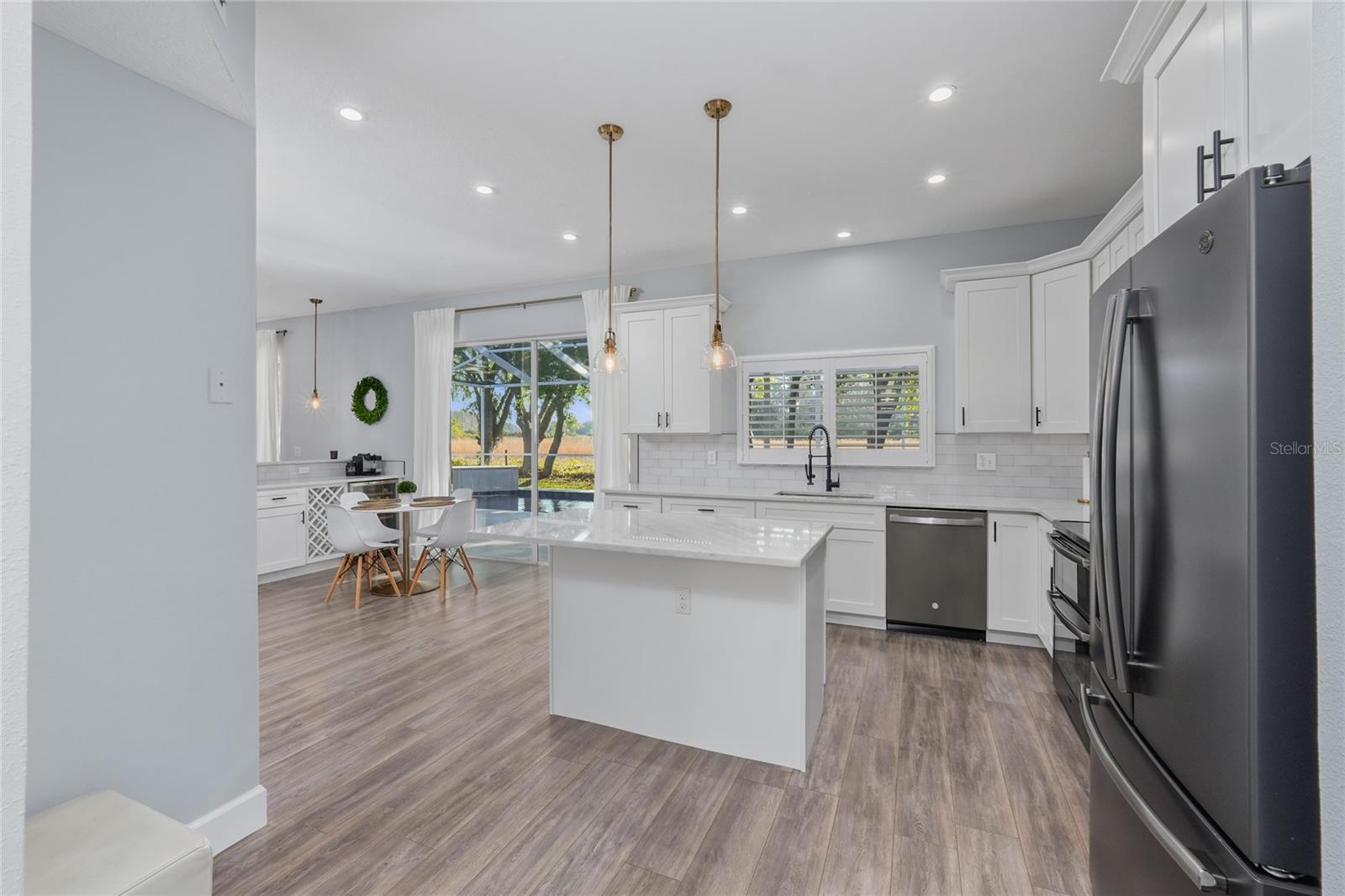 The Kitchen was fully remodeled and features marble countertops and Black Stainless GE Appliances