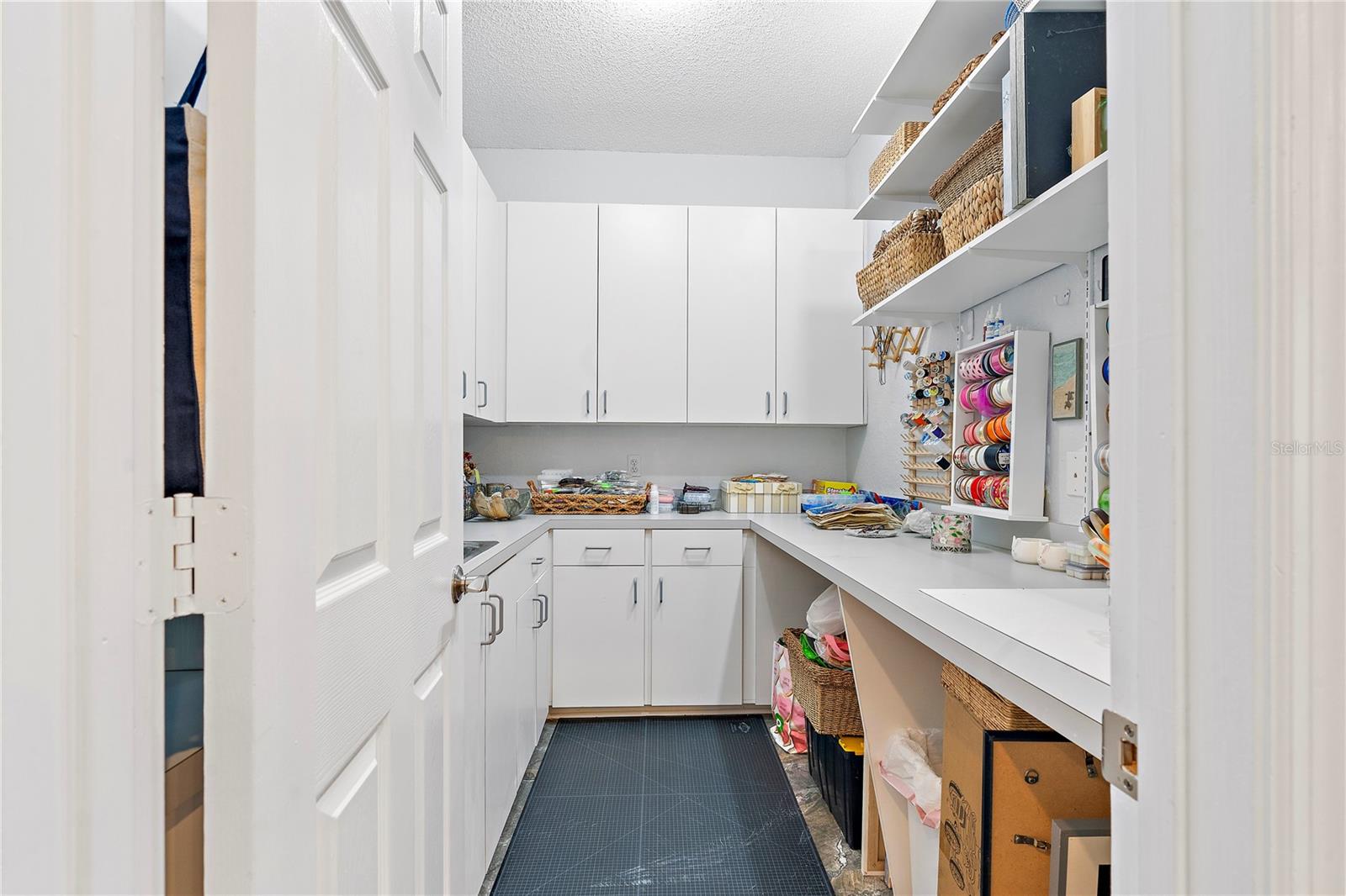 Bonus room on first floor next to DR. Makes great butler pantry or craft room