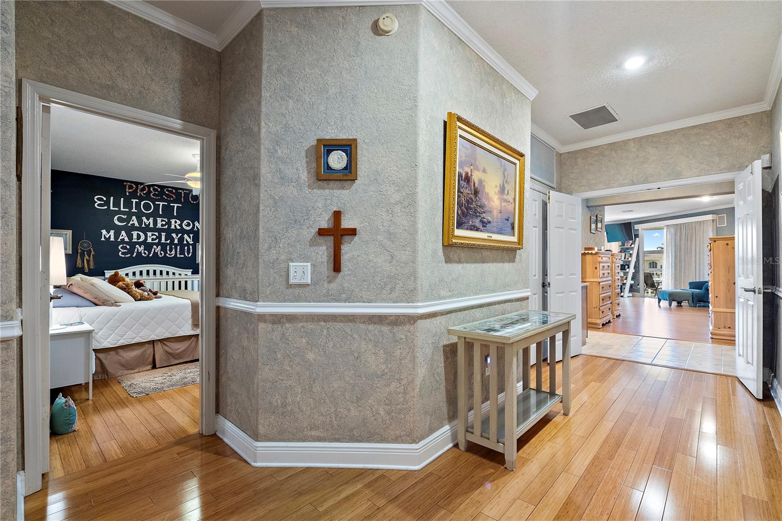 Hallway to Primary Bedroom and Bedroom 2