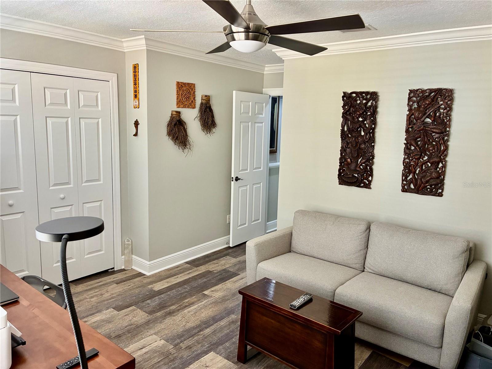 Master bedroom with ensuite bath being used as an in home office  #1