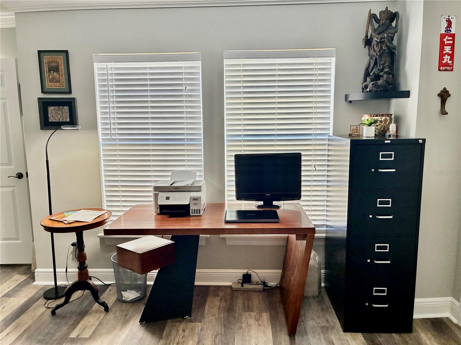 Master bedroom with ensuite bath being used as an in home office #2