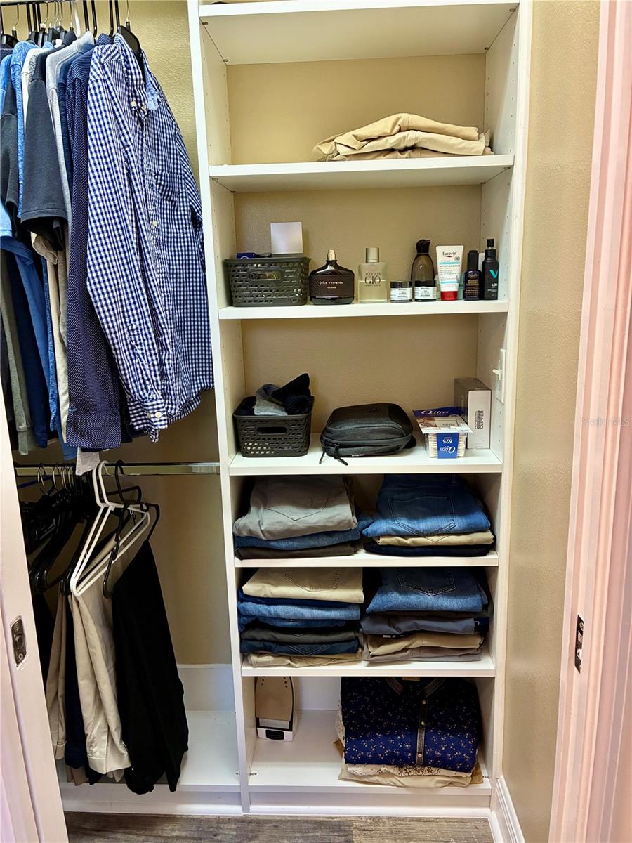 Second bedroom Walk in closet with built in shelving system