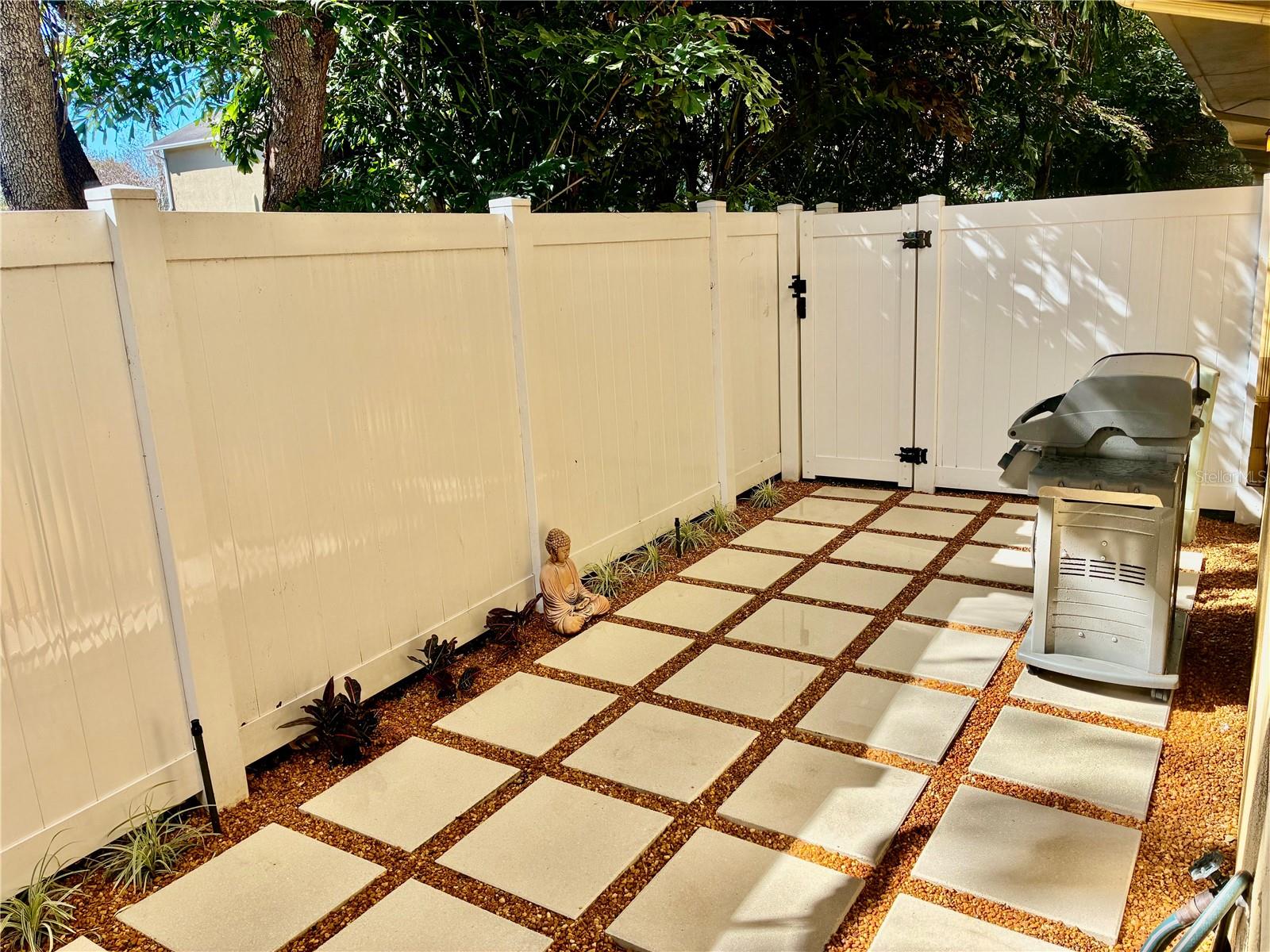 Private fenced in backyard Zen garden perfect for outdoor grilling and relaxing #1