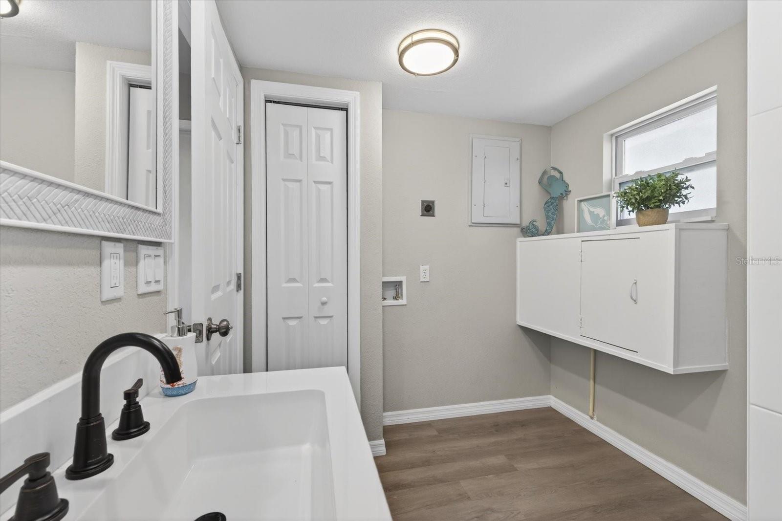 Primary bathroom with washer/ventless dryer hookup