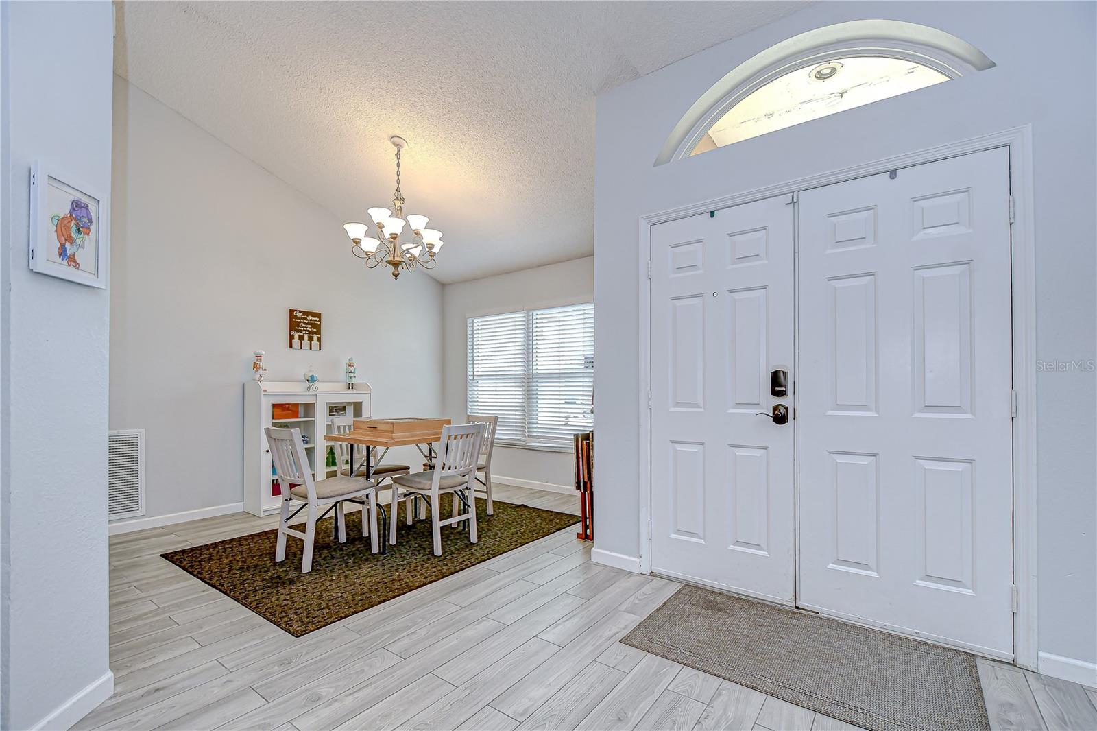 Inviting dining space & foyer.