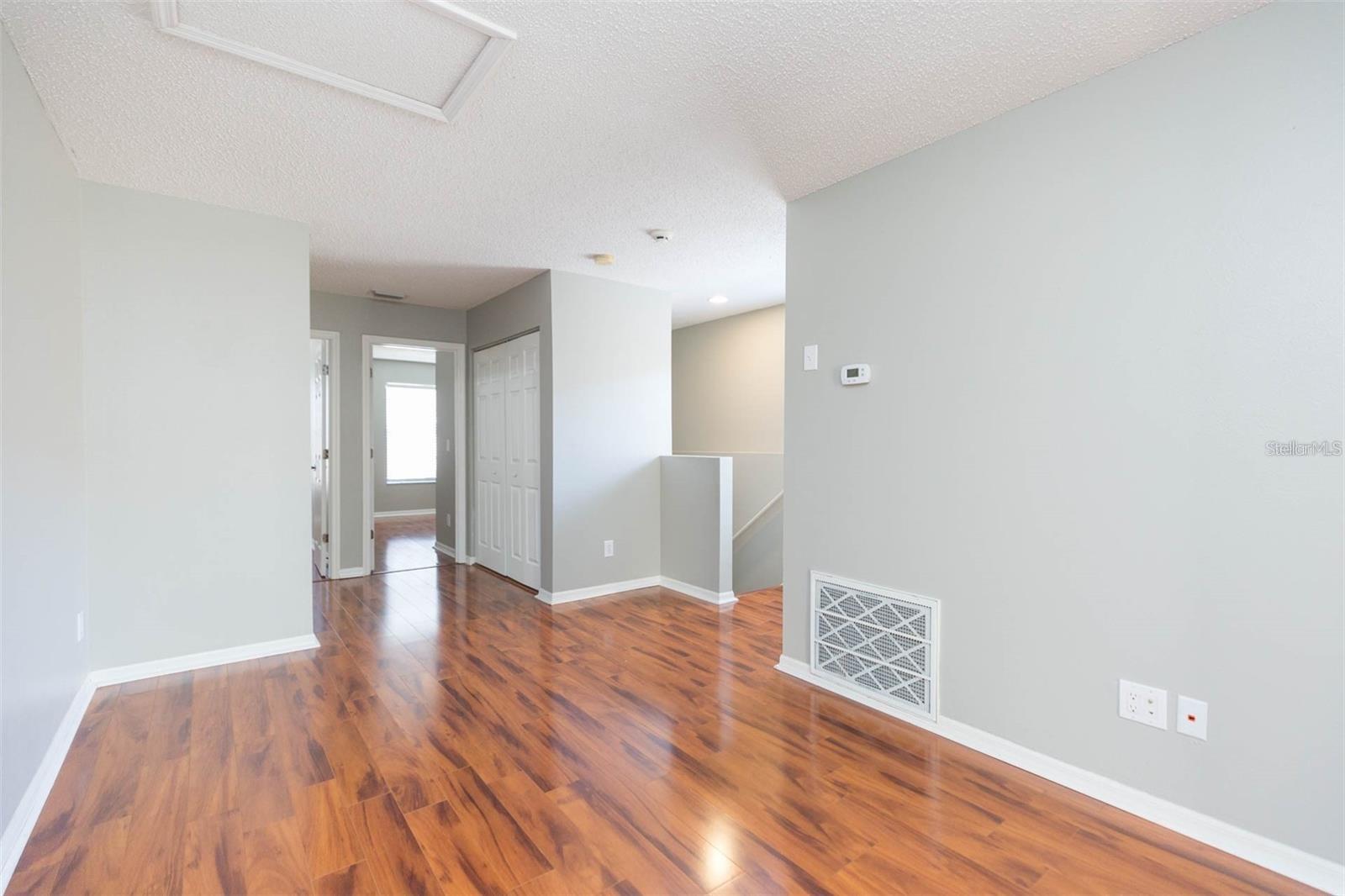 Second floor - first two bedrooms located straight through those open doors.