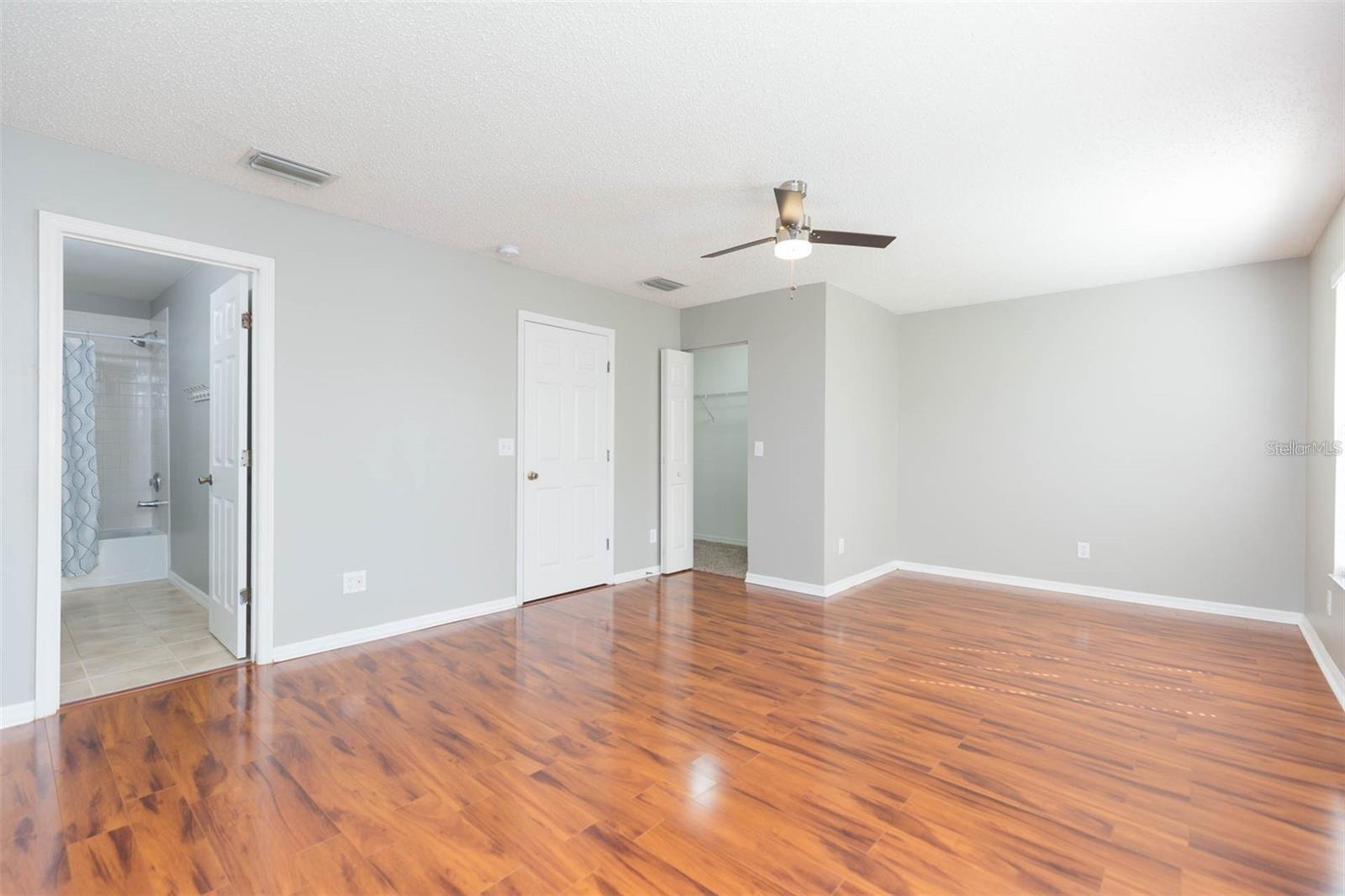 Master bedroom w/ en-suite bath, overlooking pond views