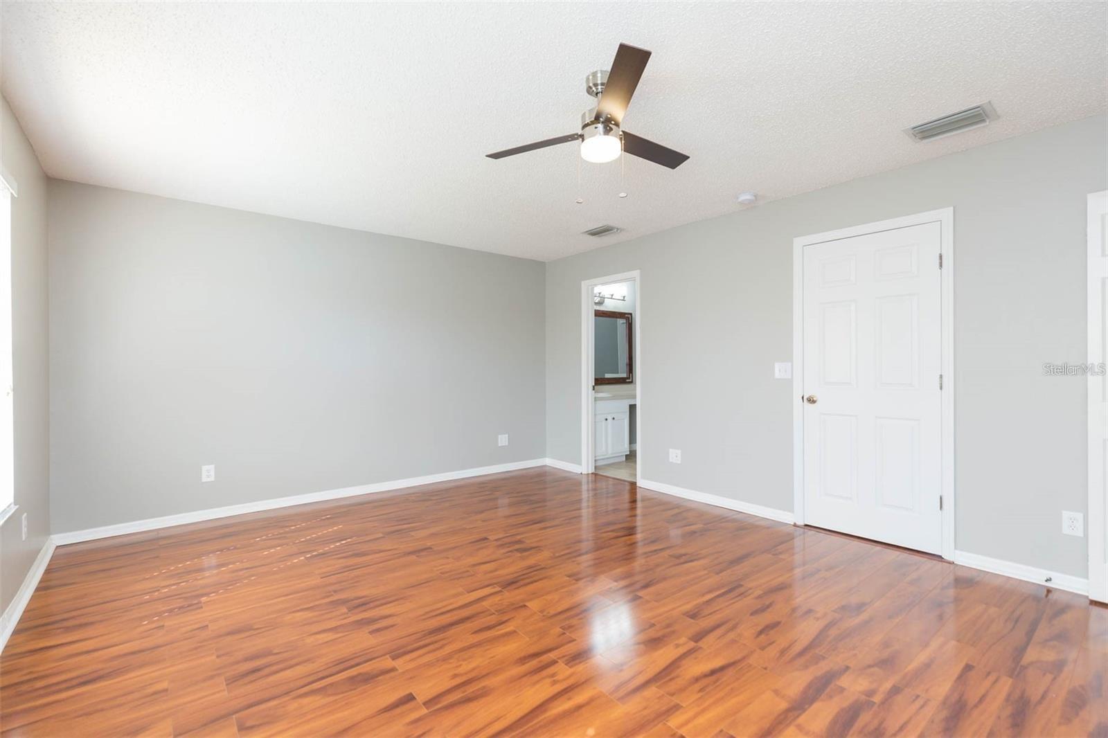 Master bedroom w/ en-suite bath, overlooking pond views