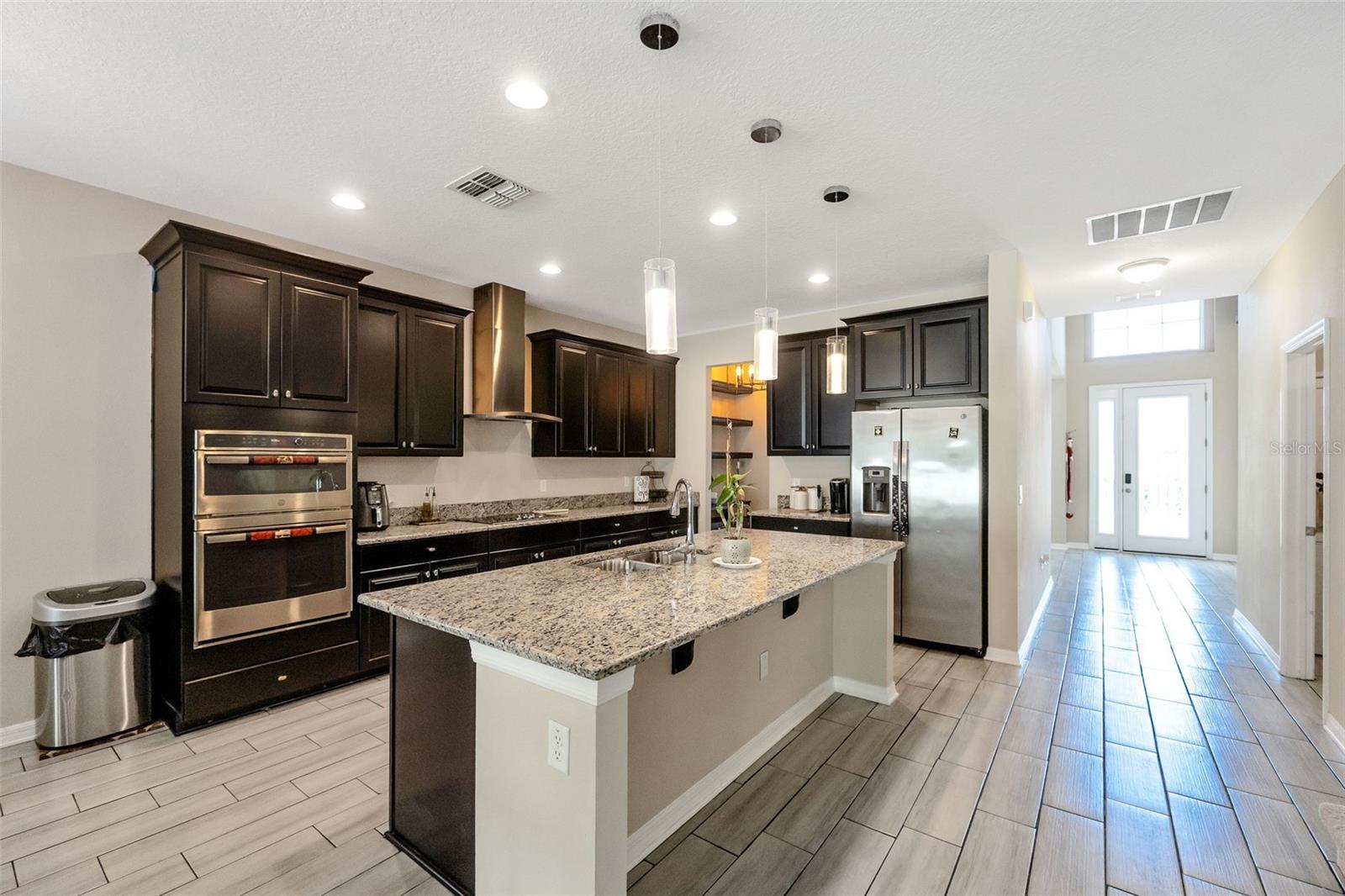 Kitchen with view of entry
