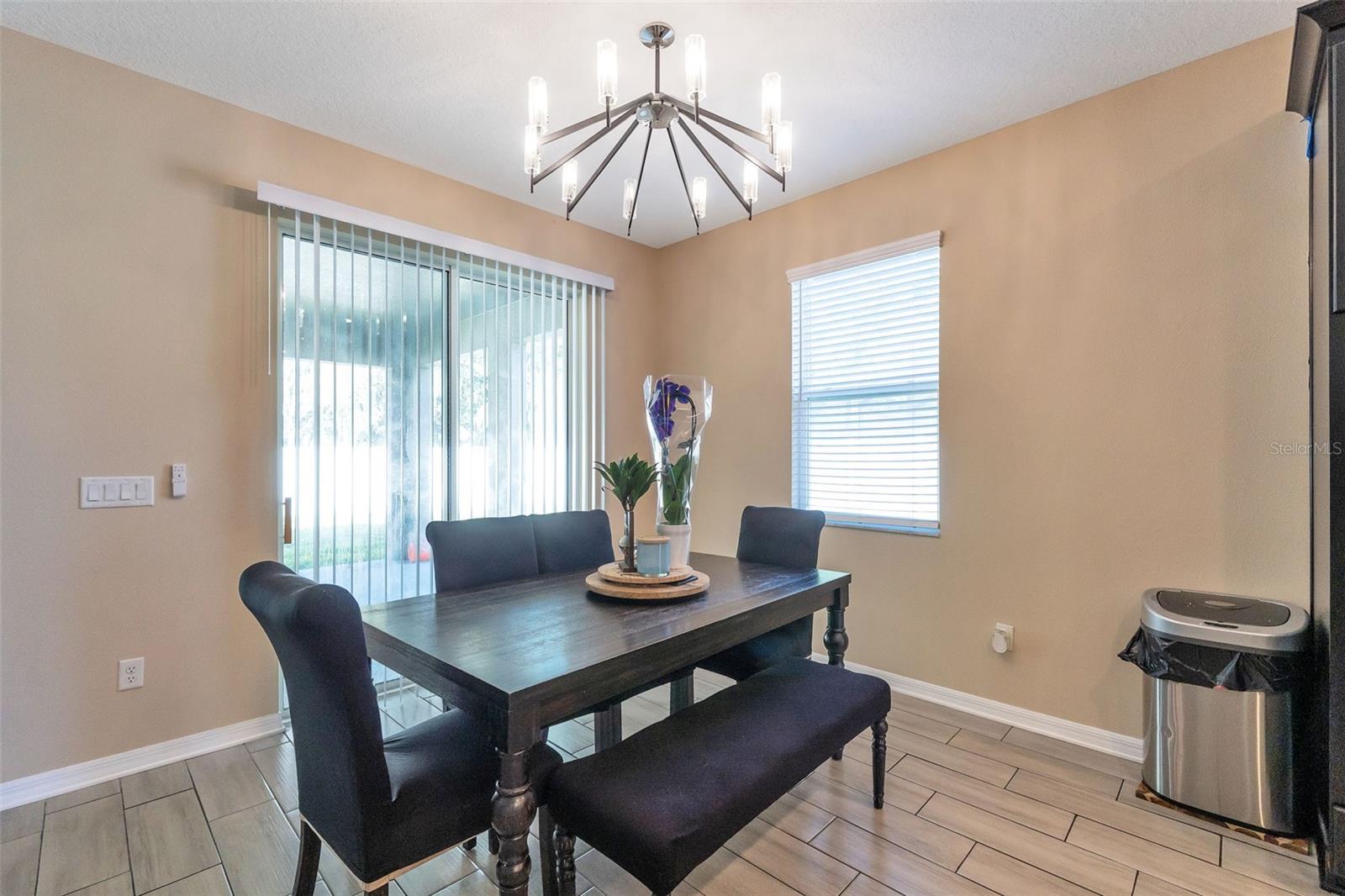 Dining nook with sliding glass doors