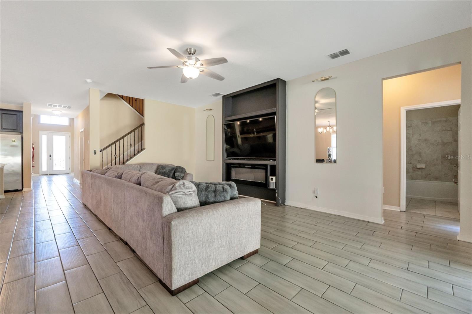 Living room with view of front entry