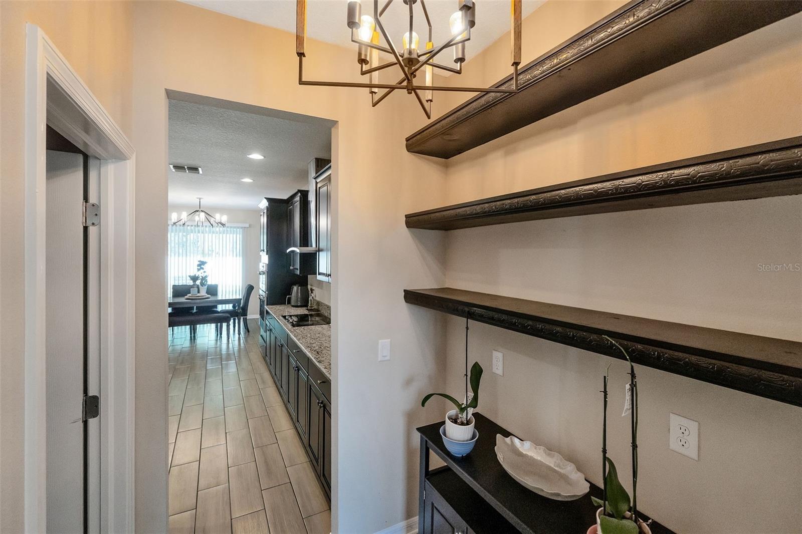 Butlers pantry/walkthrough between kitchen and dining/flex space