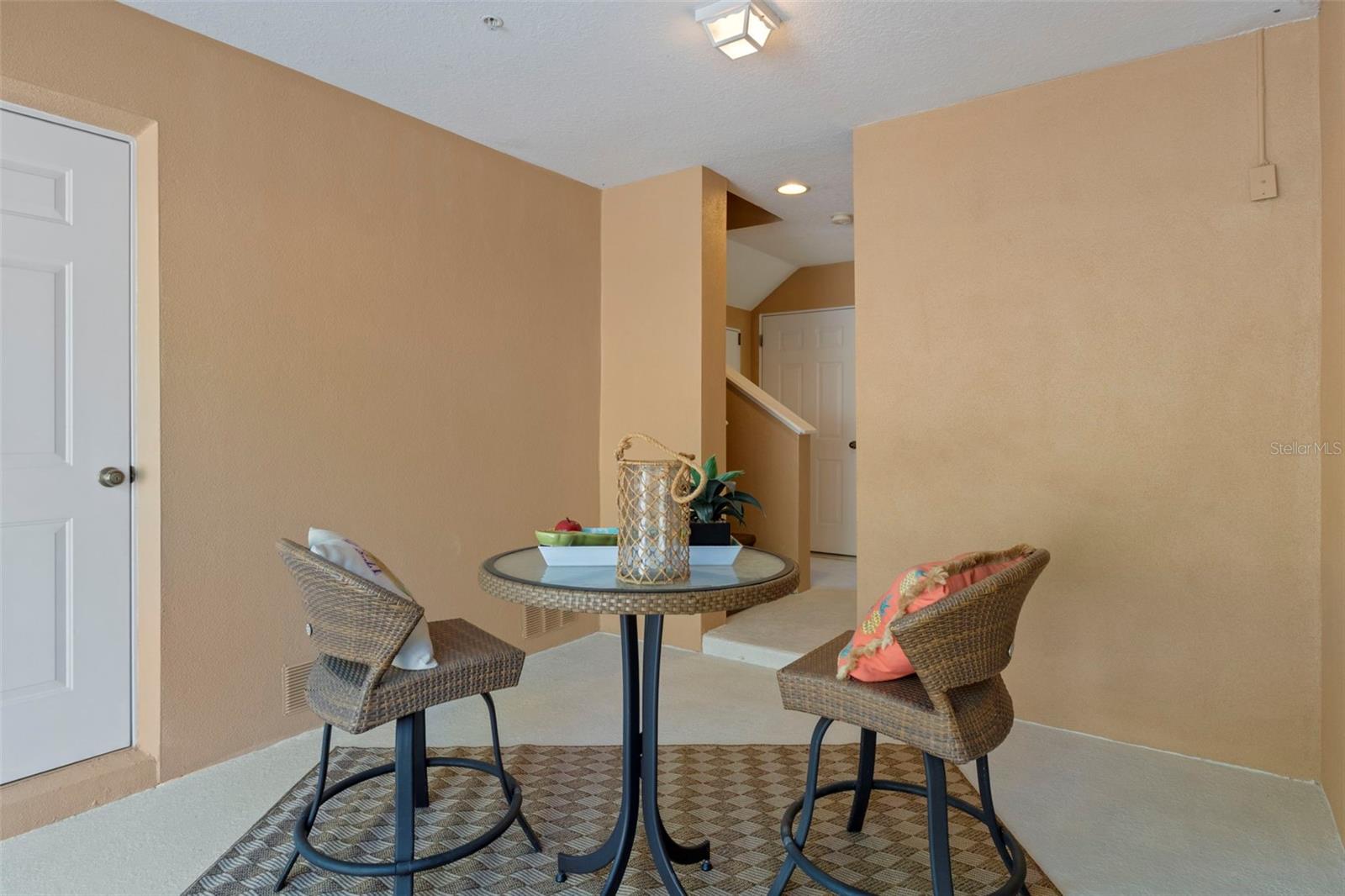 Lanai - storage room where the white door is