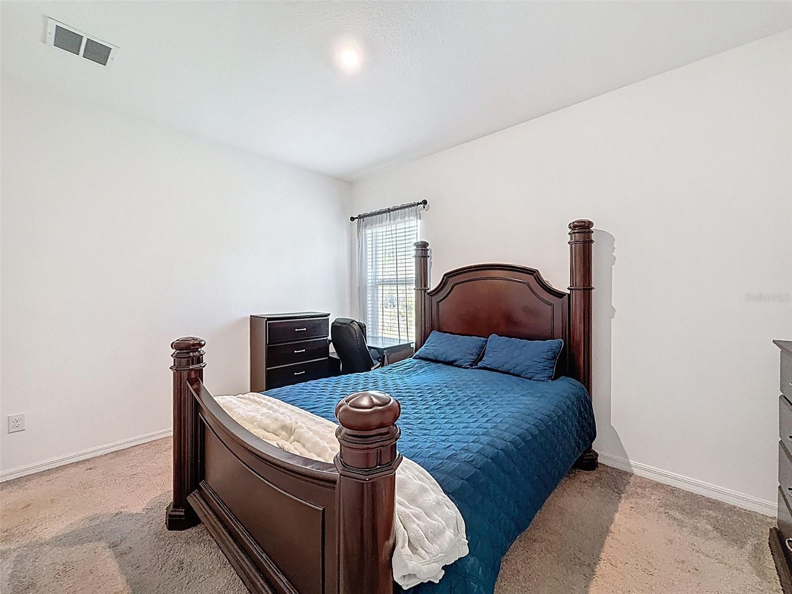 Inviting bedroom with flexible living space