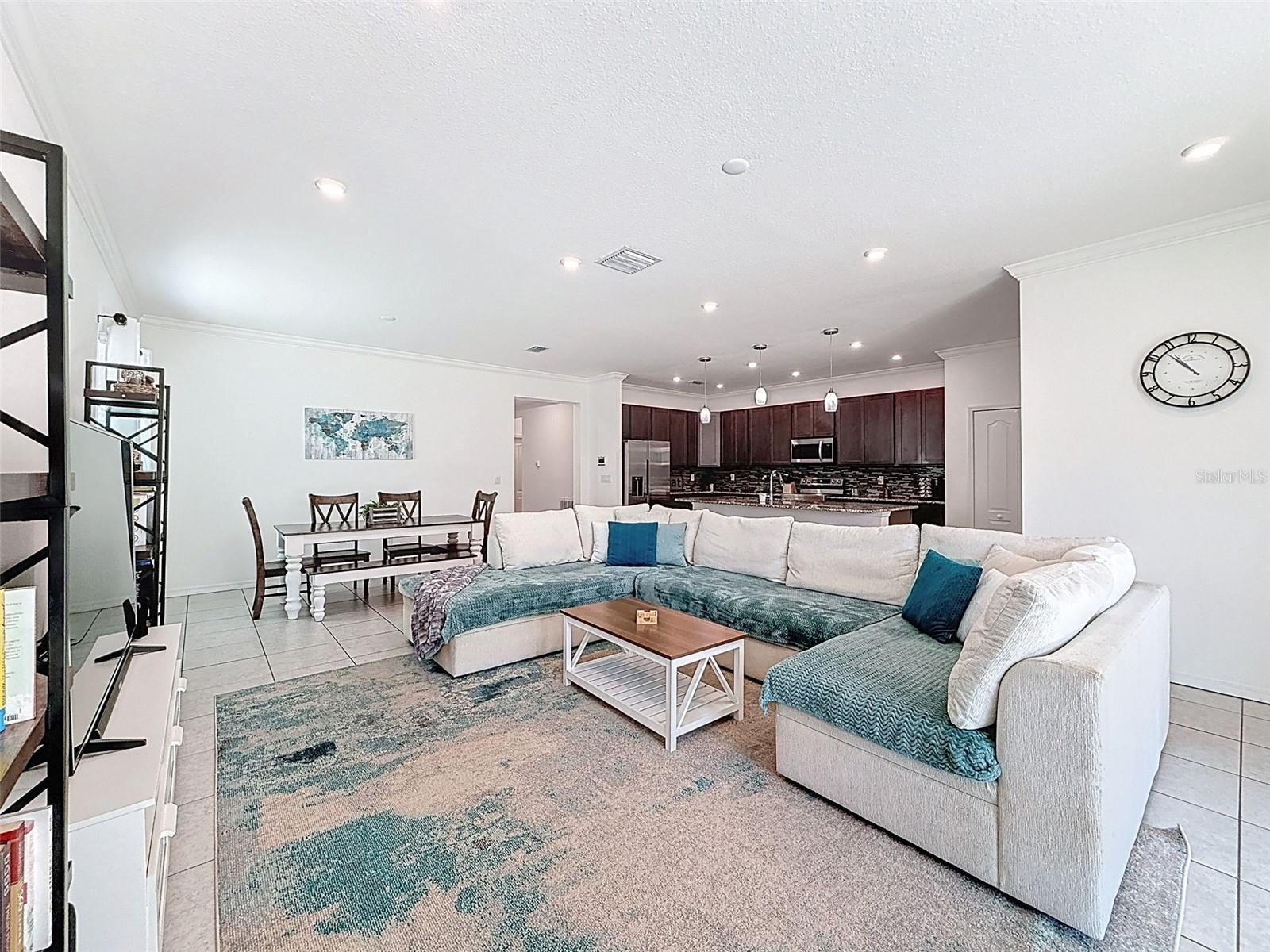 Ample space for large sectional and additional furnishings