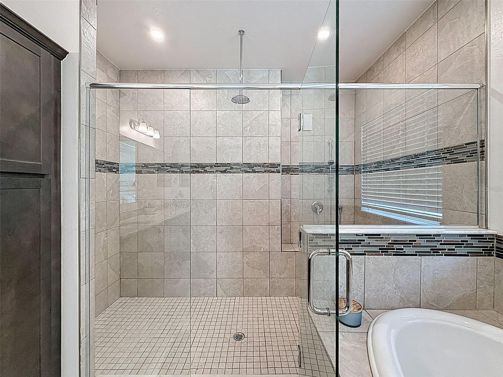 Upgraded oversized shower with dual shower heads