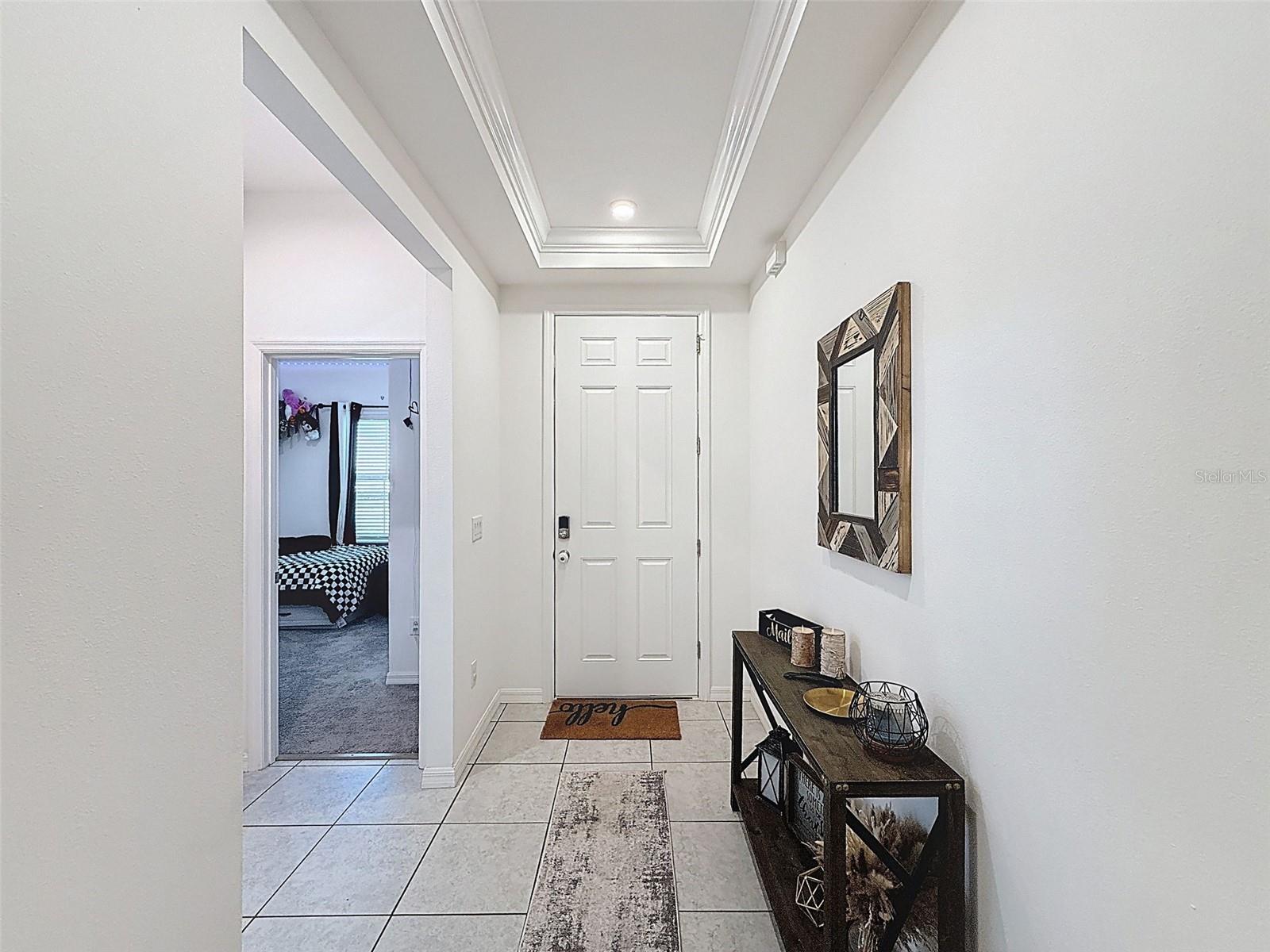 Bright hallway view toward front door