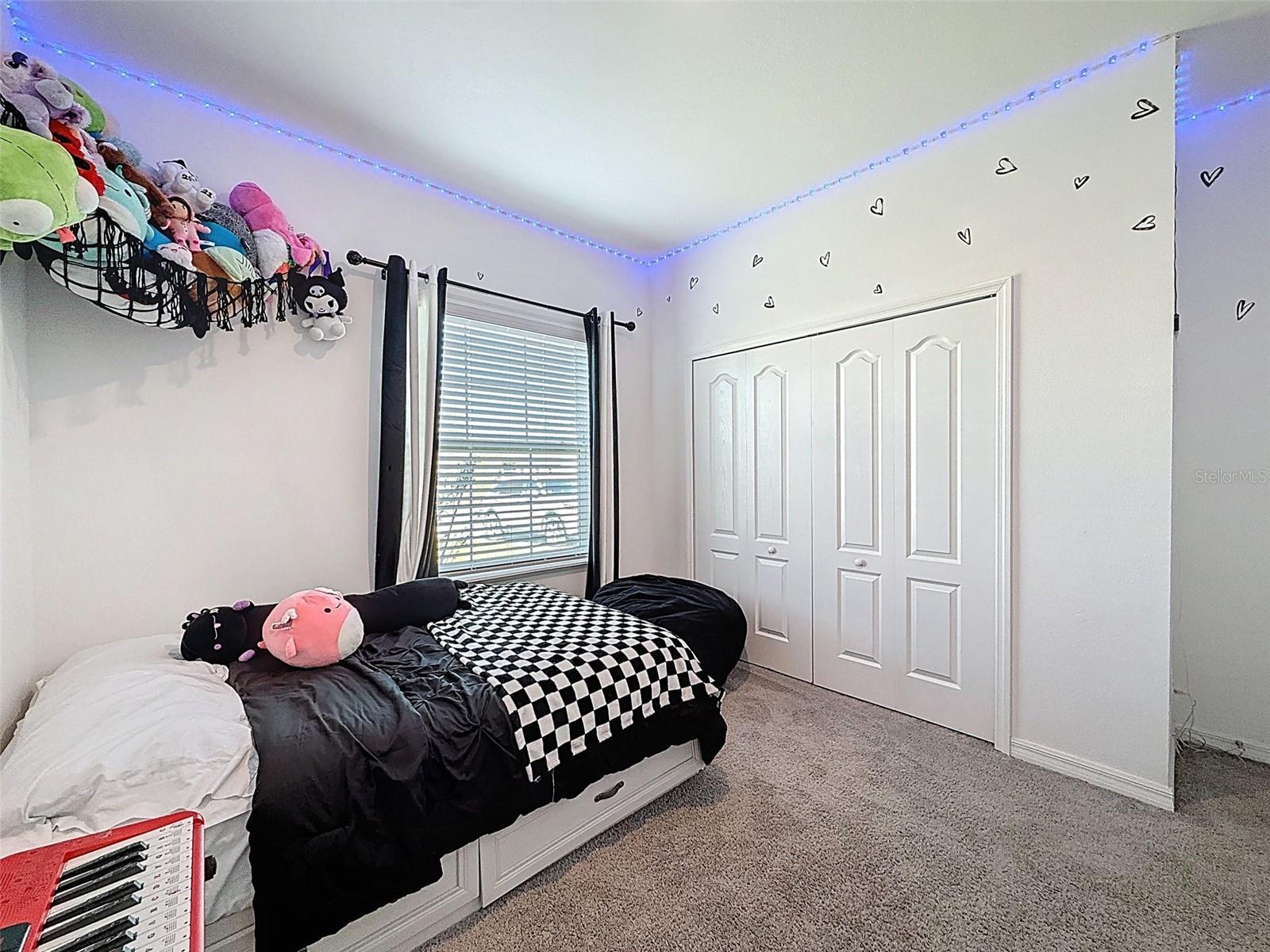 Bright front bedroom with cheerful natural light