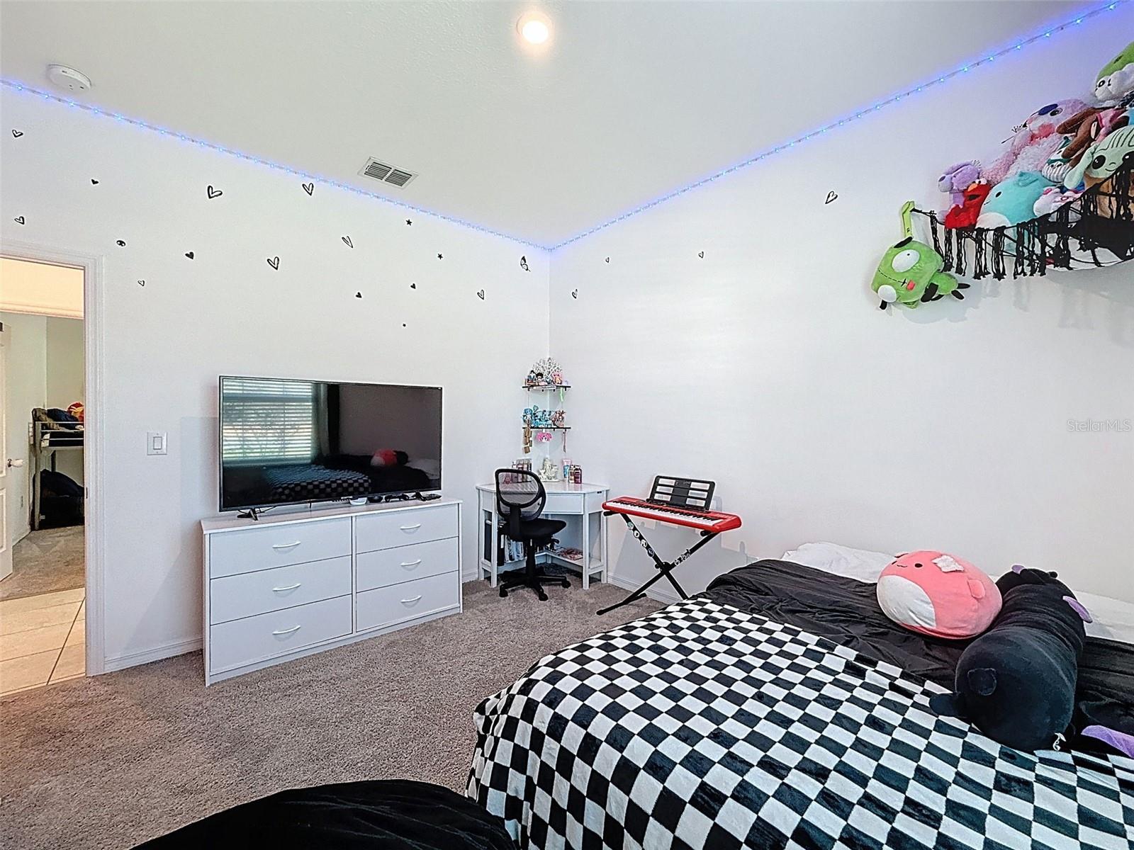 Cozy bedroom with welcoming front-facing views