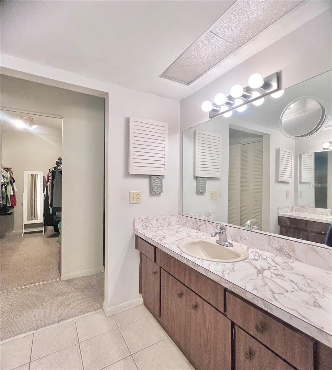 Primary bathroom with 2 seperate his and her vanities