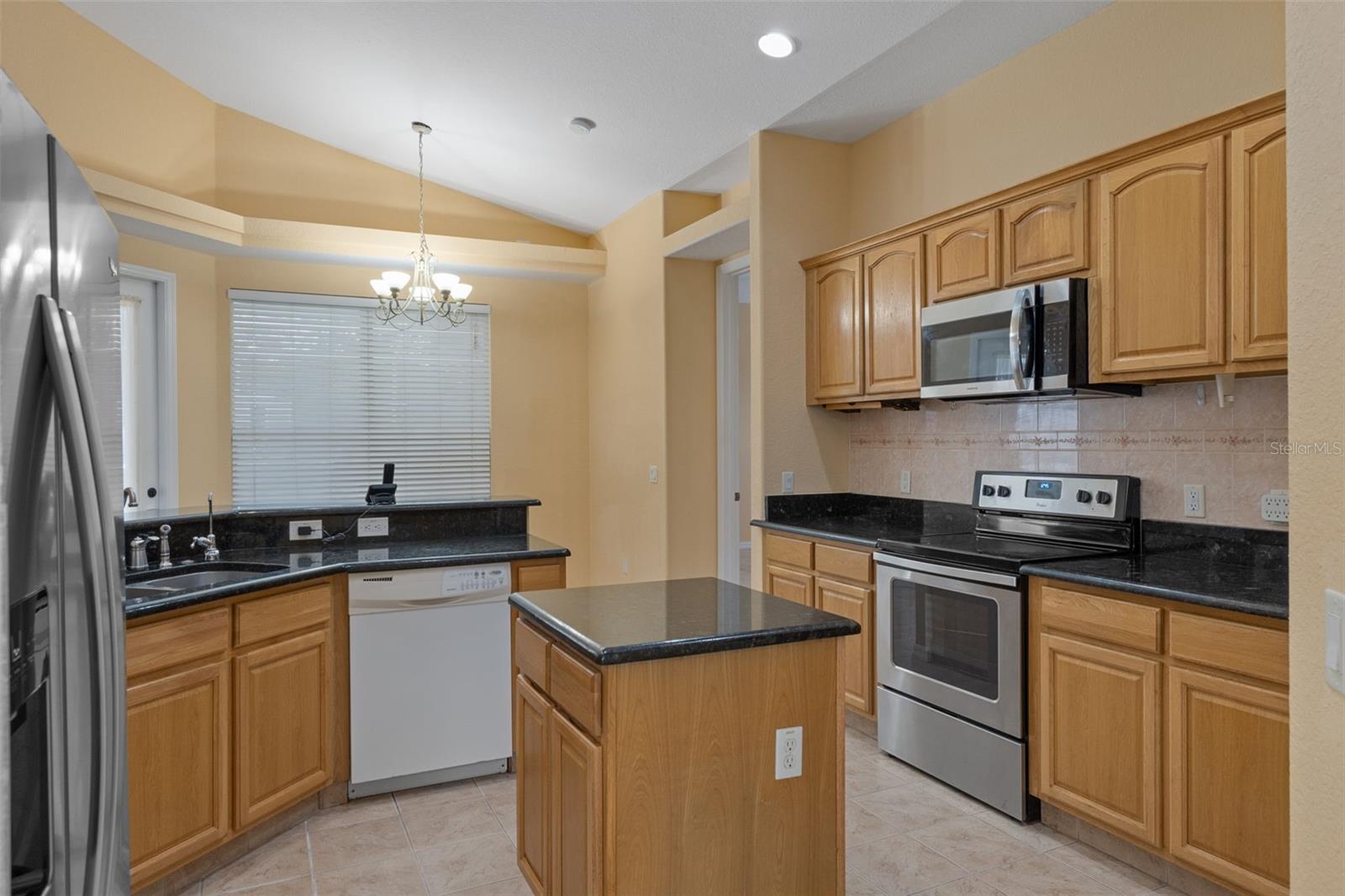 Notice the stainless steel appliances