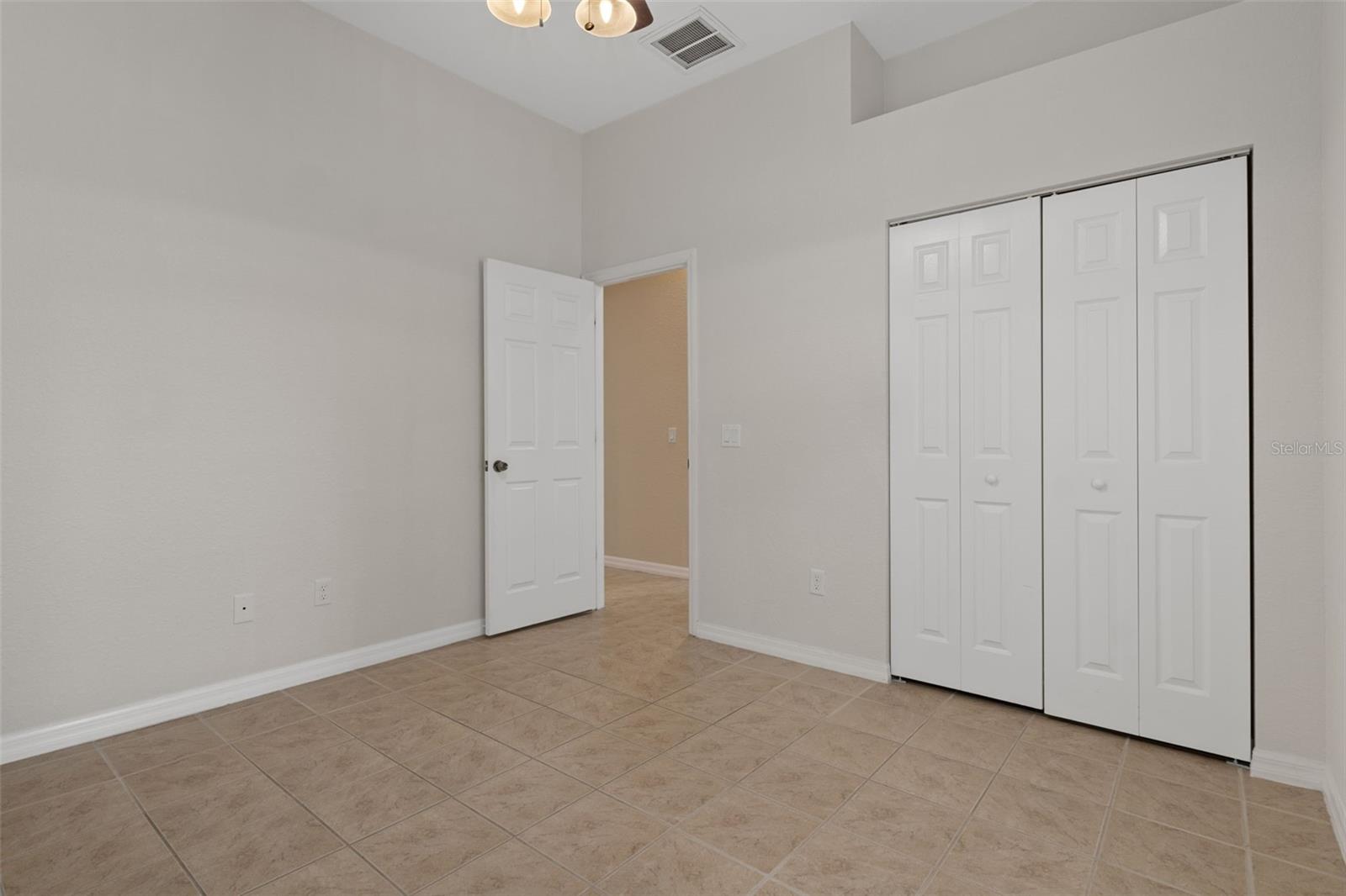 There is a large closet in this bedroom