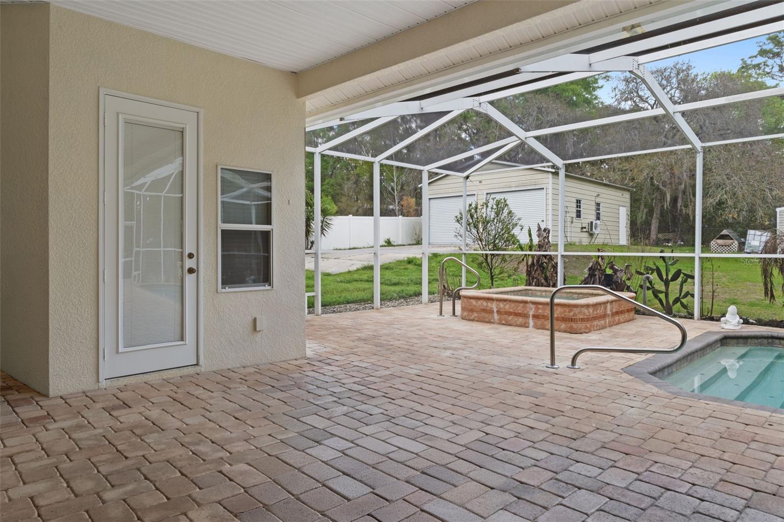 Door to the Pool Bath in the screened in pool area