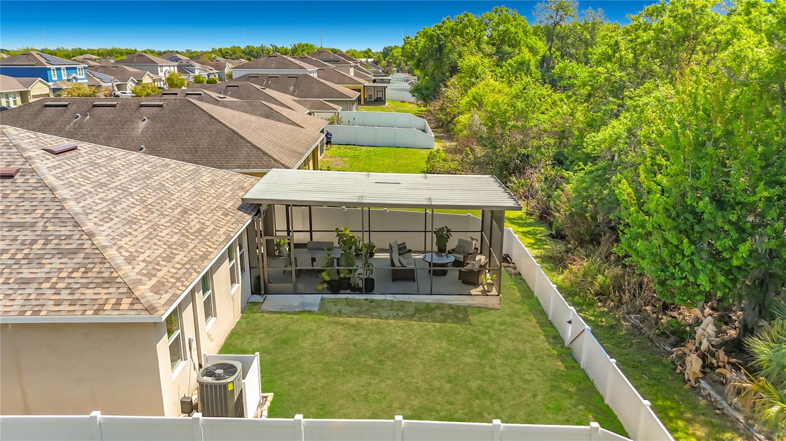 Private fenced backyard oasis with screened lanai & conservation views, no rear neighbors