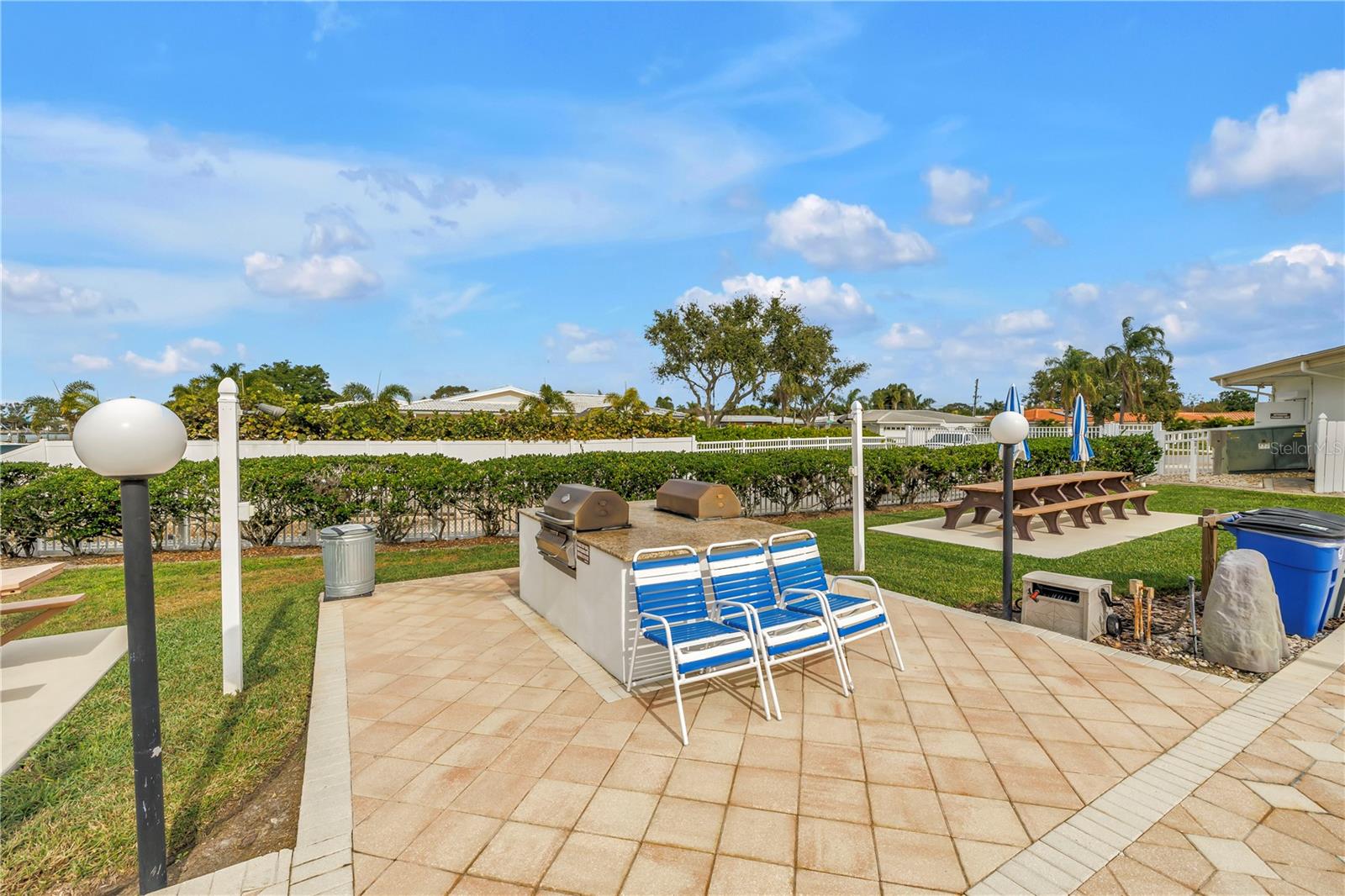 Directly across from  your building you will find grills and a great pool!