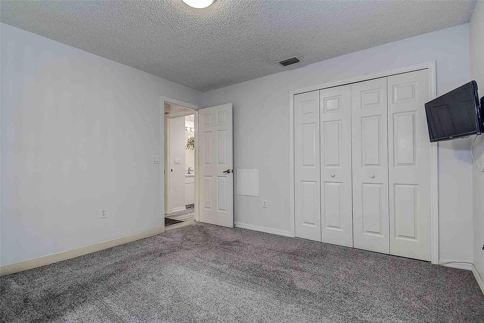 Secondary bedroom with easy access to secondary full bath.