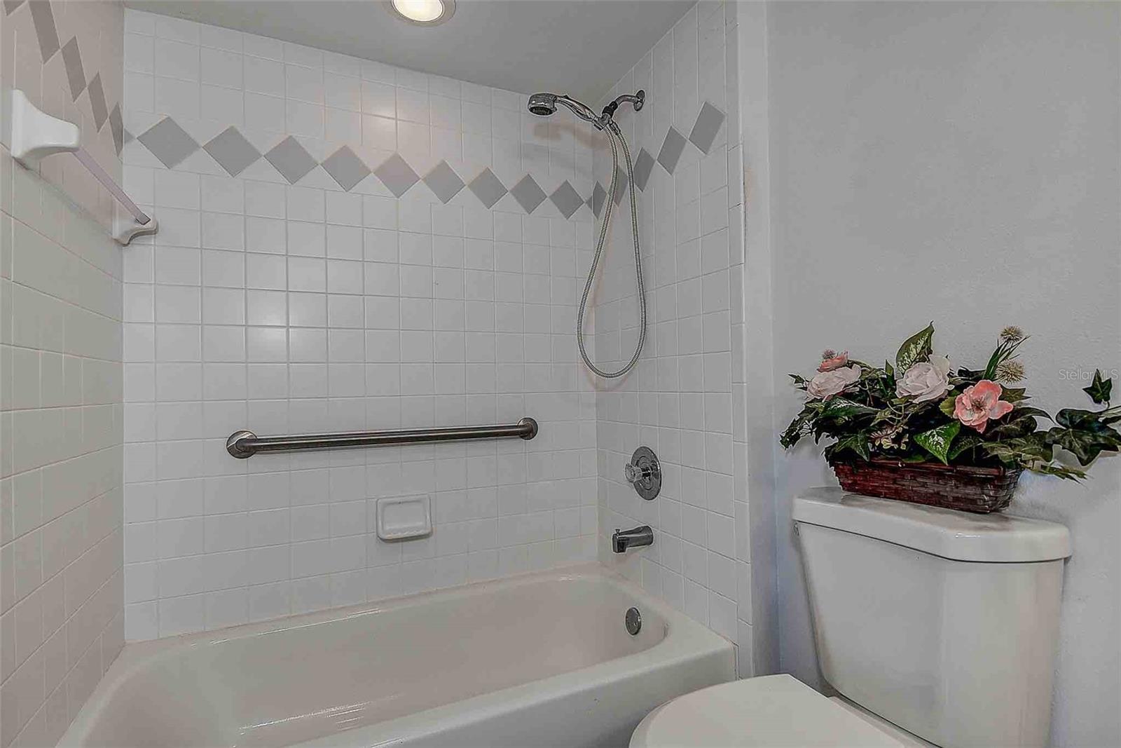 Secondary bathroom full bath with tub/shower.