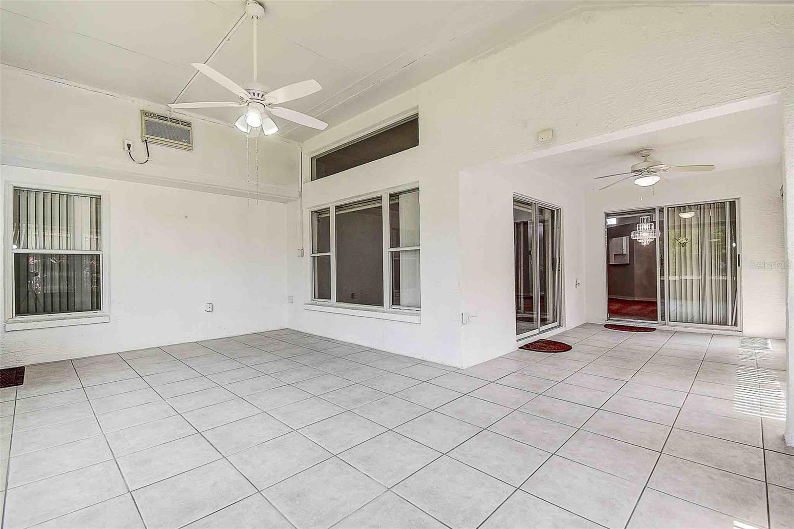 Spacious outdoor enclose lanai, ideal for entertaining friends and family.