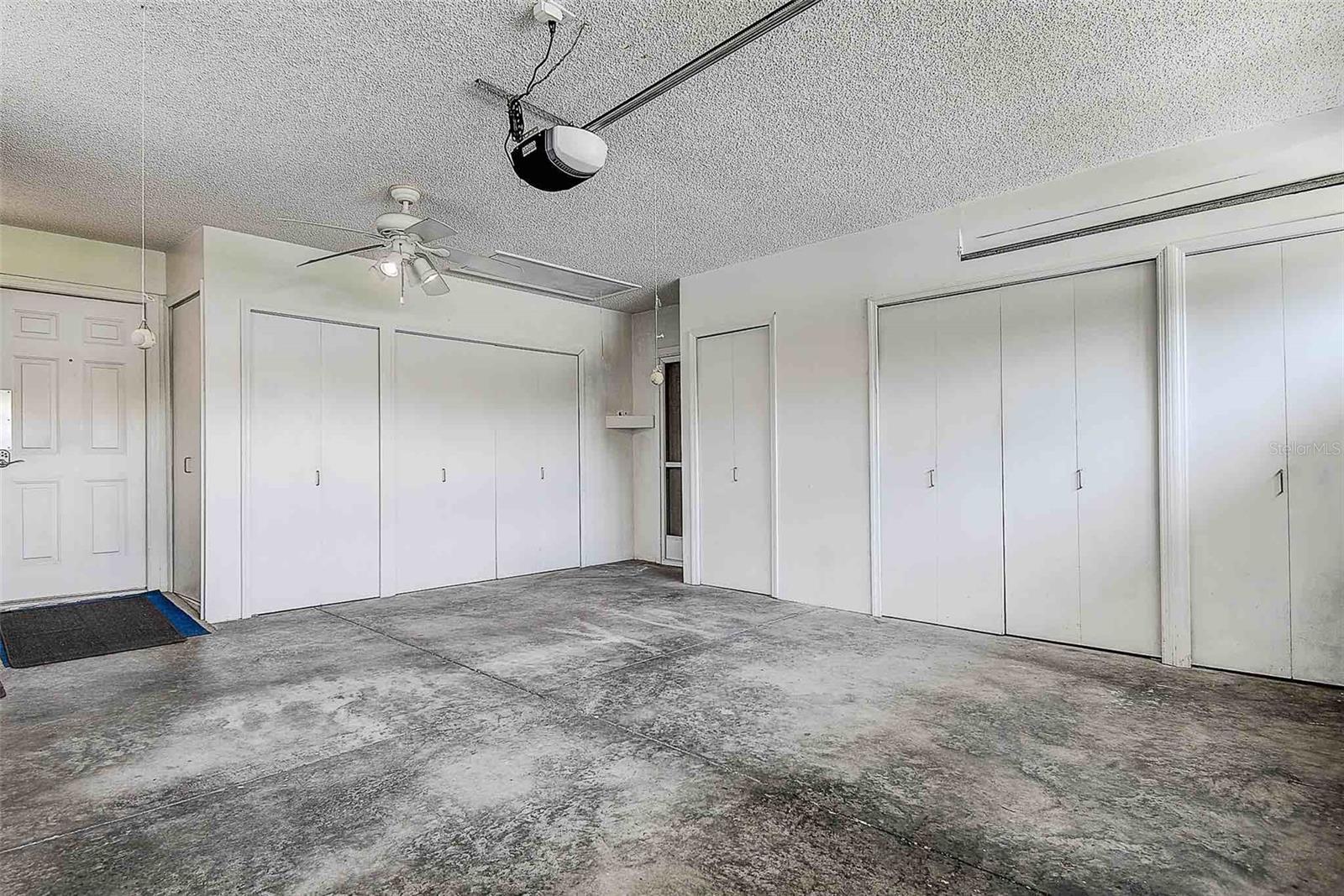 Built in storage organizers throughout the garage, new overhead DGD800 garage door opener (2022).