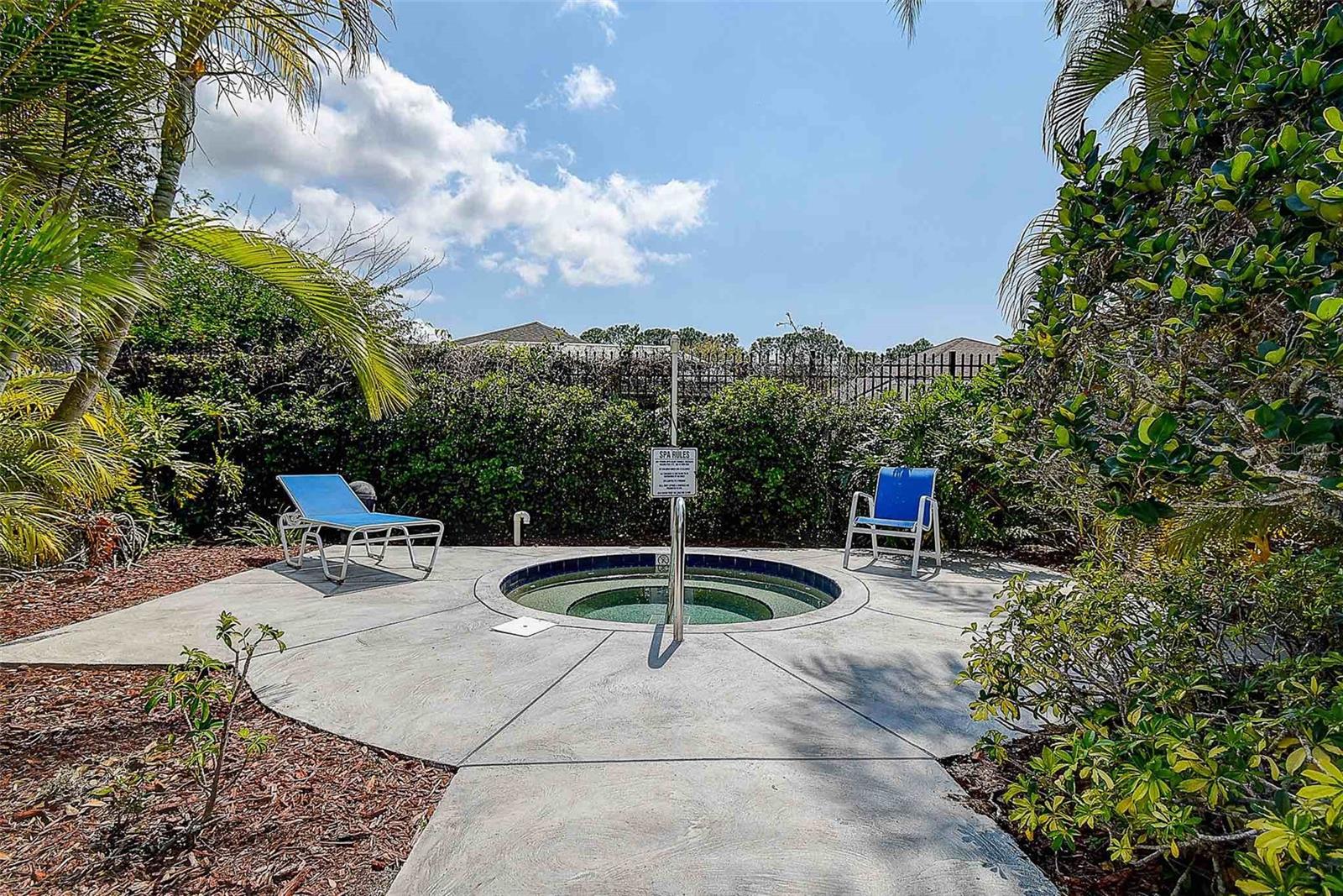 Wyndtree Village community spa within pool area.