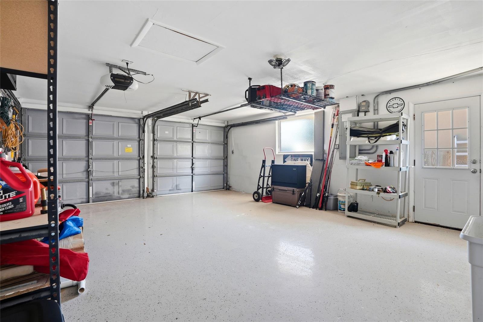 Huge garage with metal storage shelves