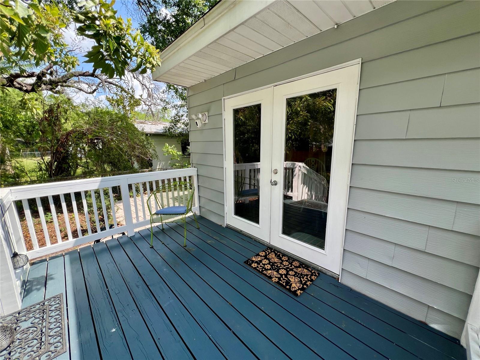 A back deck for enjoying the privacy of your lush back yard
