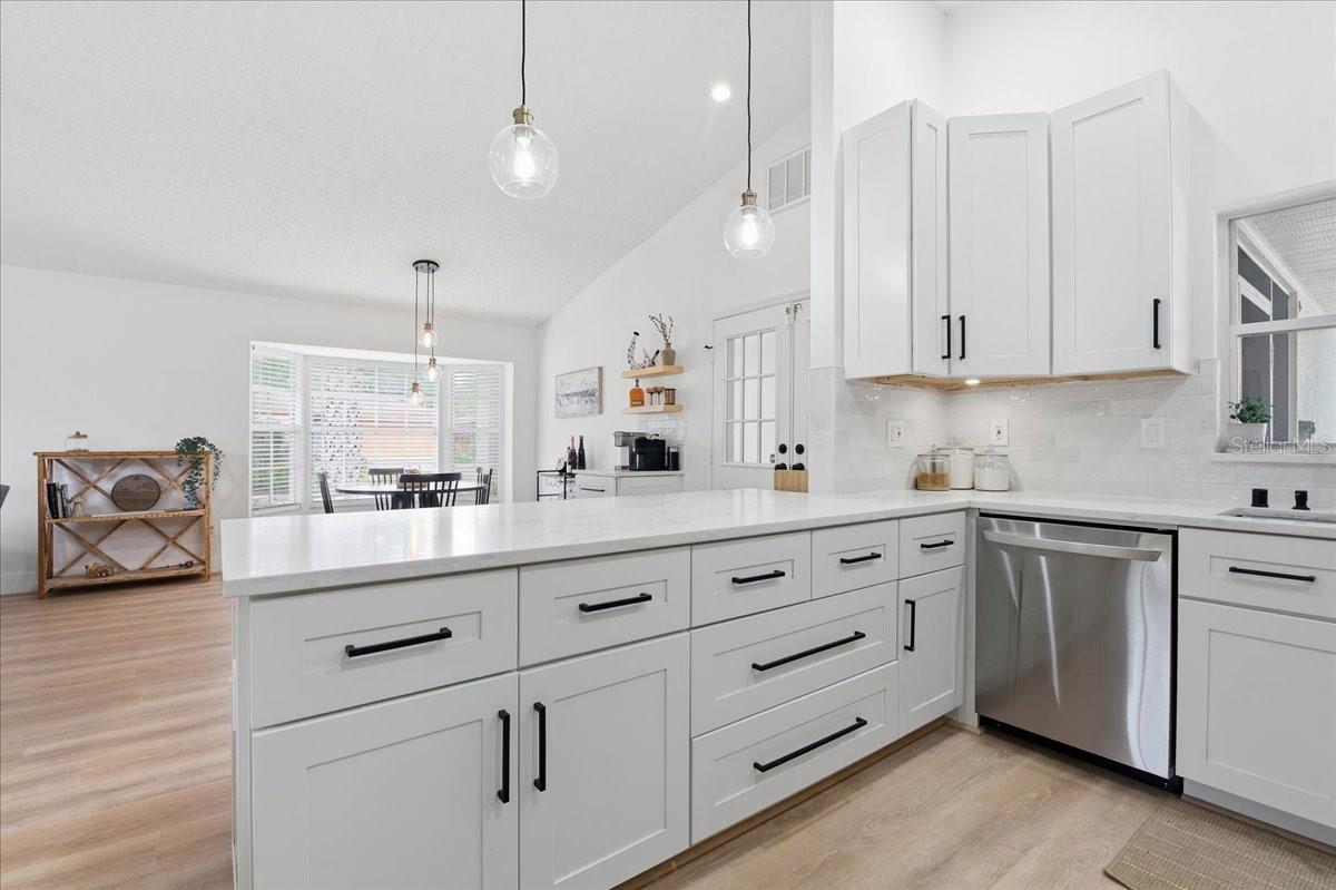 UPDATED LIGHT FIXTURES AND CEILING FANS THROUGHOUT