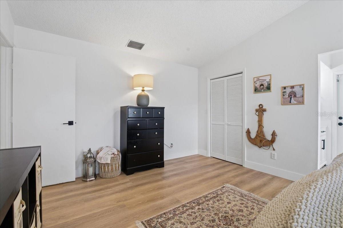 WALK-IN CLOSET IN THE PRIMARY BEDROOM