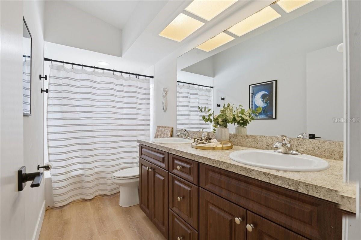 DUAL SINK VANITY IN THE GUEST BATHROOM AS WELL!