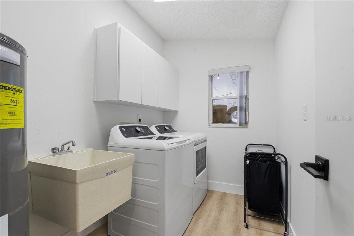 SPACIOUS LAUNDRY ROOM WITH UTILITY SINK