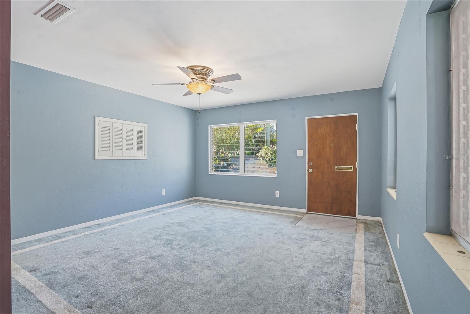 Open view from the kitchen into the living area, creating a connected and welcoming feel.