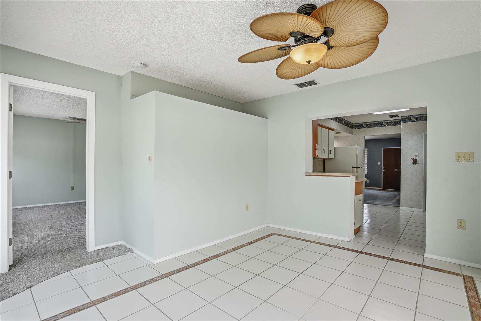 Ceiling fans throughout the home, including the living and dining areas, all bedrooms, for added comfort.