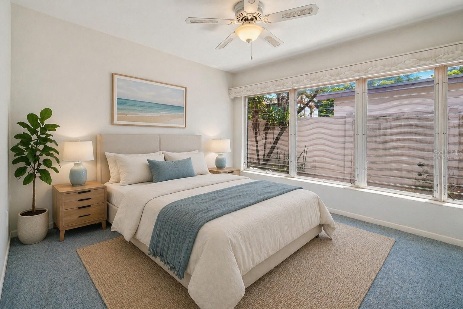 Third bedroom with ceiling fan and flexible space for guests, family, or a home office. Virtually Staged