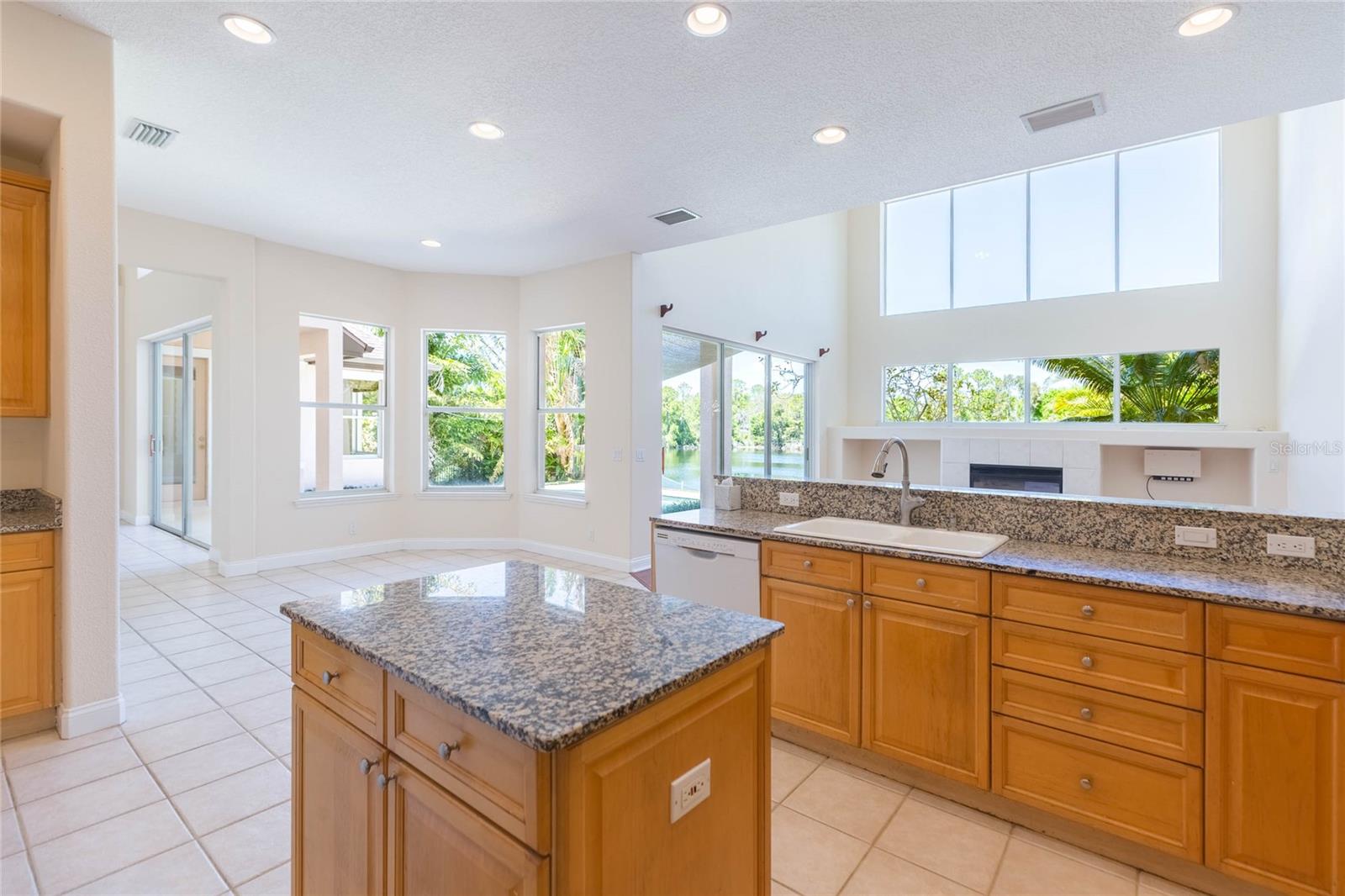 High ceilings, large kitchen with lots of exterior light
