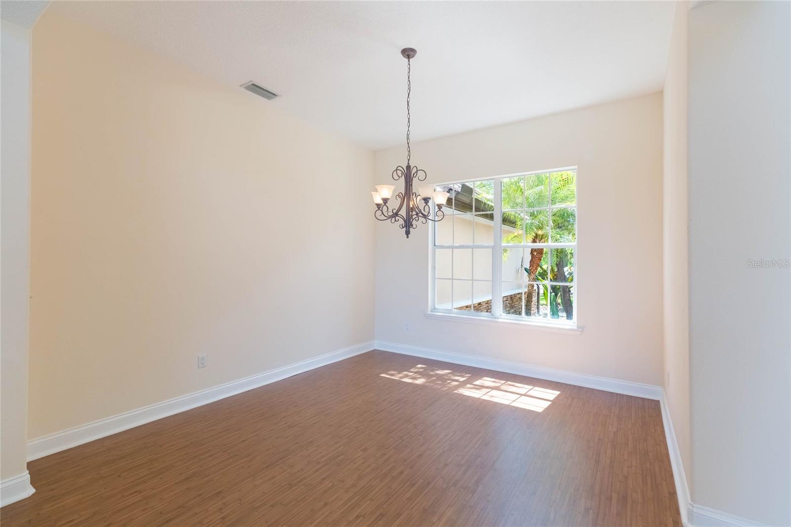 Formal dining room is light and bright