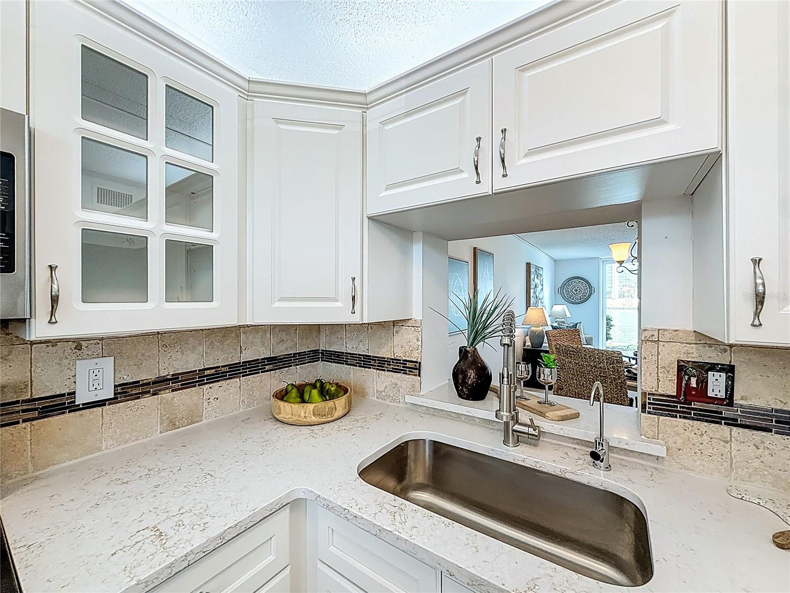 quartz counters, filtered water and easy pass-through