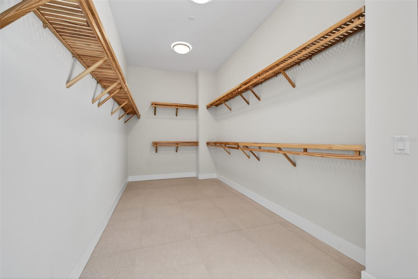 Primary Suite Walk-in Closet (1 of 2)